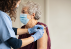 Elderly woman getting vaccinated